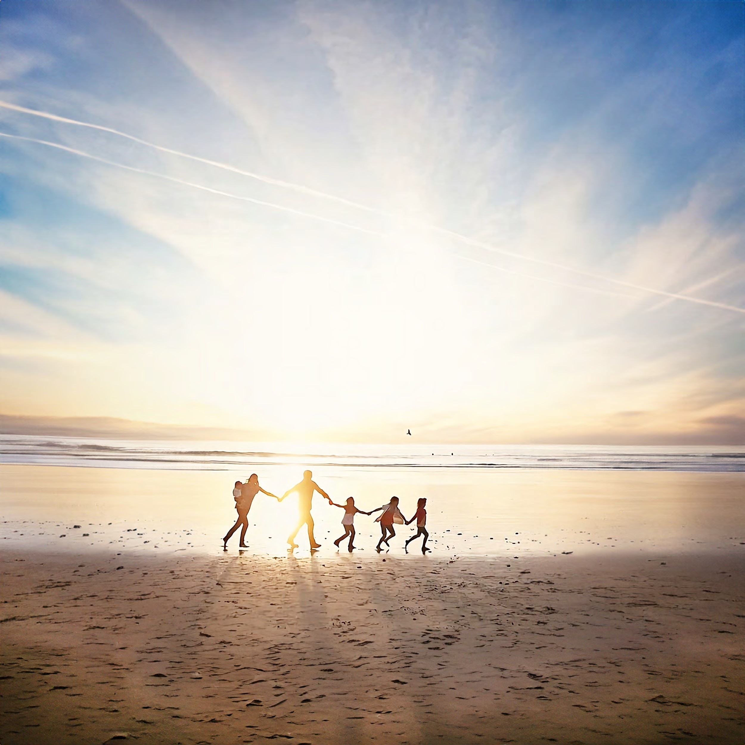 Family at sunset on Naiyang Beach near TIARA Saku villas